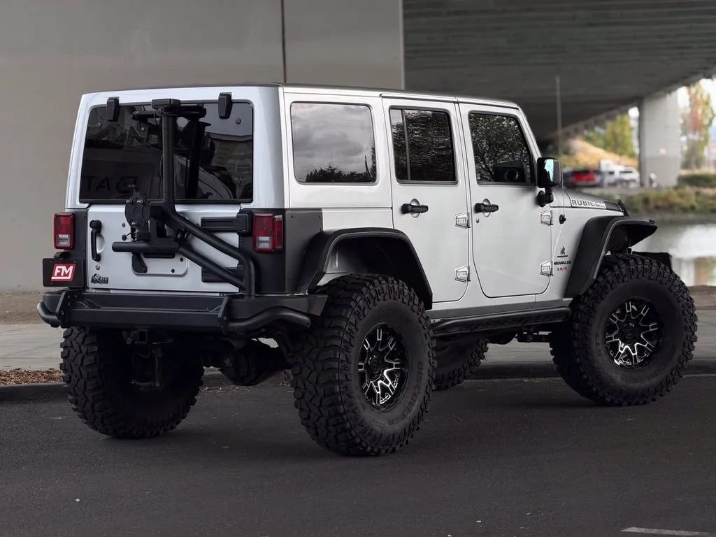 Used 2011 Jeep Wrangler Unlimited Rubicon w/ Dual Top Group AWD/4WD image 8
