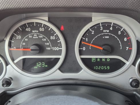 Used 2010 Jeep Wrangler Unlimited Sahara w/ Dual Top Group AWD/4WD image 12