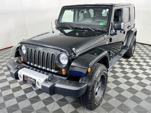 Used 2013 Jeep Wrangler Unlimited Sahara w/ Dual Top Group AWD/4WD image 3