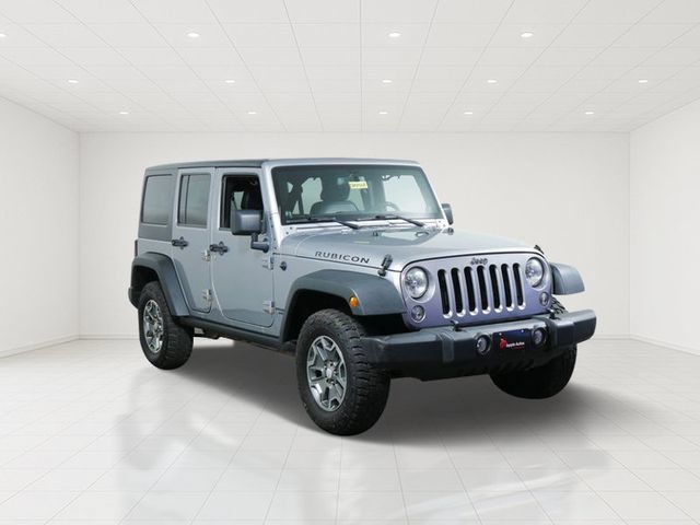 Used 2014 Jeep Wrangler Unlimited Rubicon w/ Dual Top Group AWD/4WD image 1