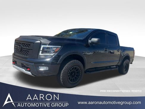 Used 2024 Nissan Titan PRO-4X w/ Pro-4x Utility Package AWD/4WD image 1