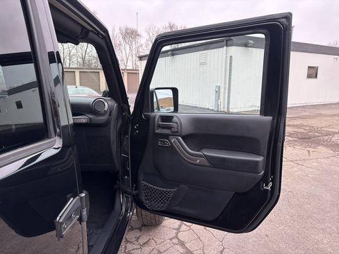 Used 2012 Jeep Wrangler Unlimited Sport AWD/4WD image 23