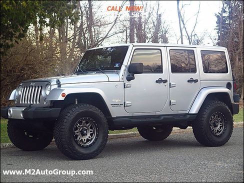 Used 2014 Jeep Wrangler Unlimited Sahara w/ Connectivity Group image 1