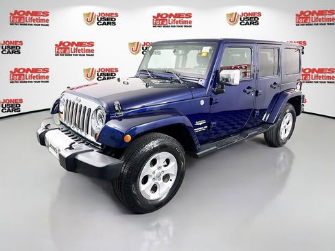 Used 2013 Jeep Wrangler Unlimited Sahara w/ Dual Top Group AWD/4WD image 12
