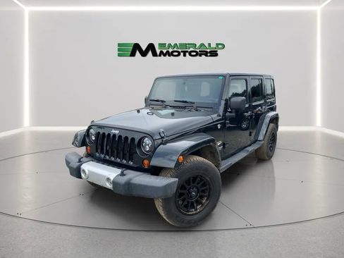 Used 2012 Jeep Wrangler Unlimited Sahara w/ Max Tow Pkg AWD/4WD image 1
