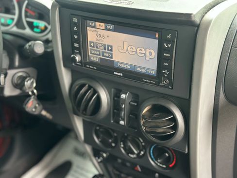 Used 2010 Jeep Wrangler Unlimited Rubicon w/ Dual Top Group image 13