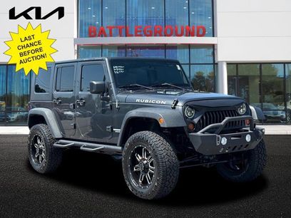 Used 2010 Jeep Wrangler Unlimited Rubicon w/ Dual Top Group