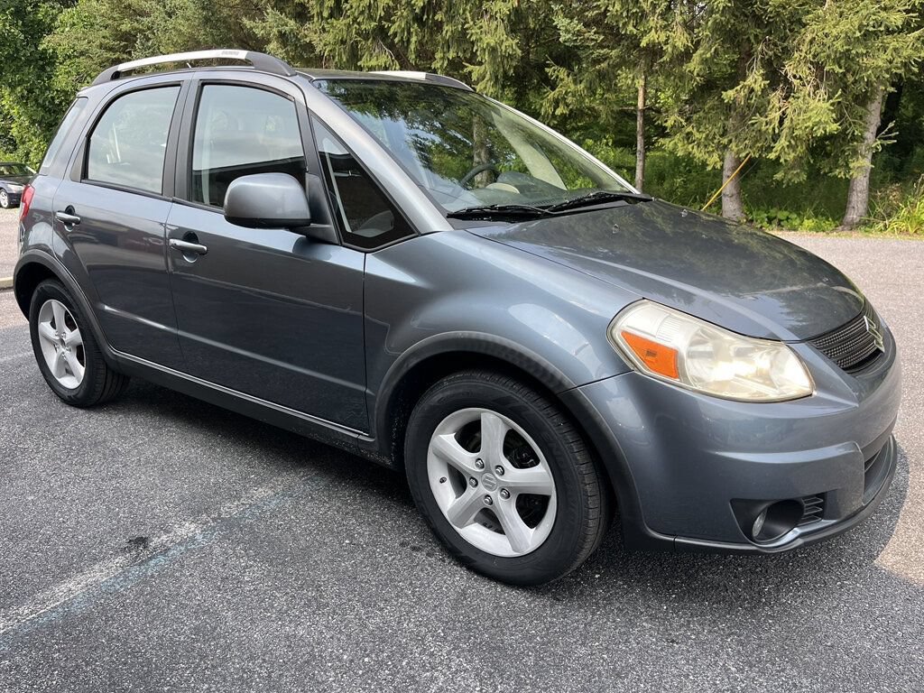 Used 2009 Suzuki SX4 AWD Hatchback w/ Touring Pkg image 1