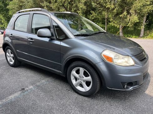 Used 2009 Suzuki SX4 AWD Hatchback w/ Touring Pkg image 1