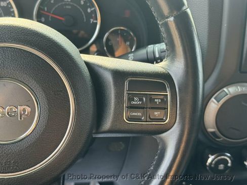 Used 2013 Jeep Wrangler Unlimited Sport AWD/4WD image 19
