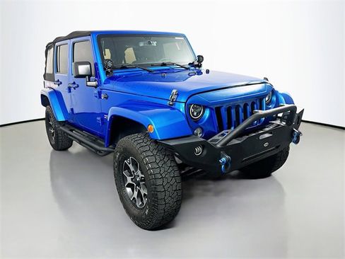 Used 2016 Jeep Wrangler Unlimited Sahara image 1