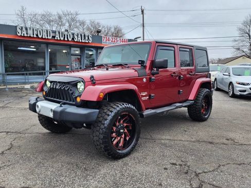 Used 2012 Jeep Wrangler Unlimited Sahara w/ Dual Top Group image 1