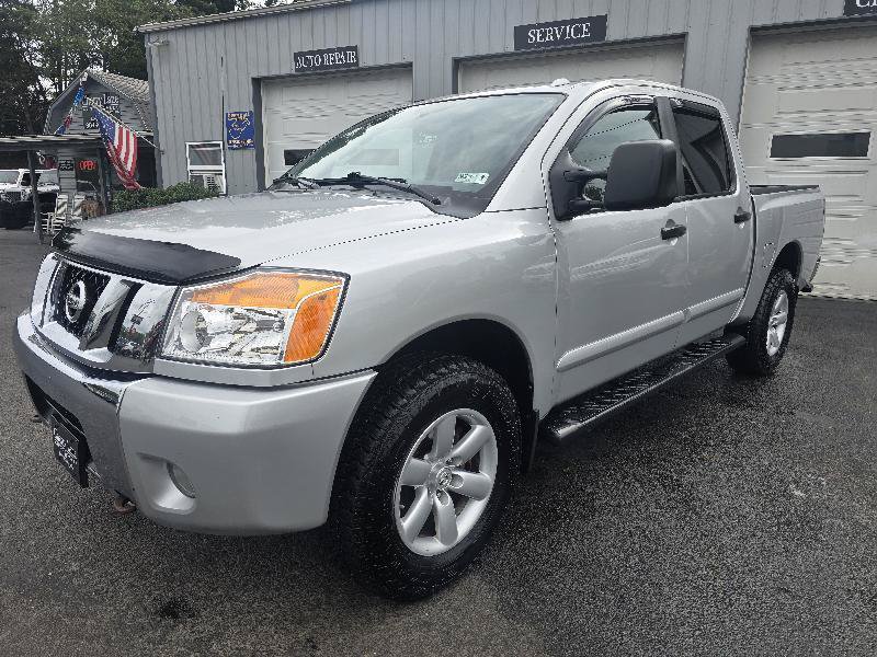 Used 2012 Nissan Titan SV w/ SV Premium Utility Pkg AWD/4WD image 1