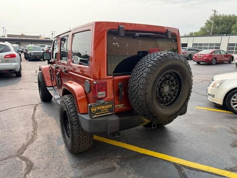 Used 2014 Jeep Wrangler Unlimited Sahara w/ Dual Top Group AWD/4WD image 6