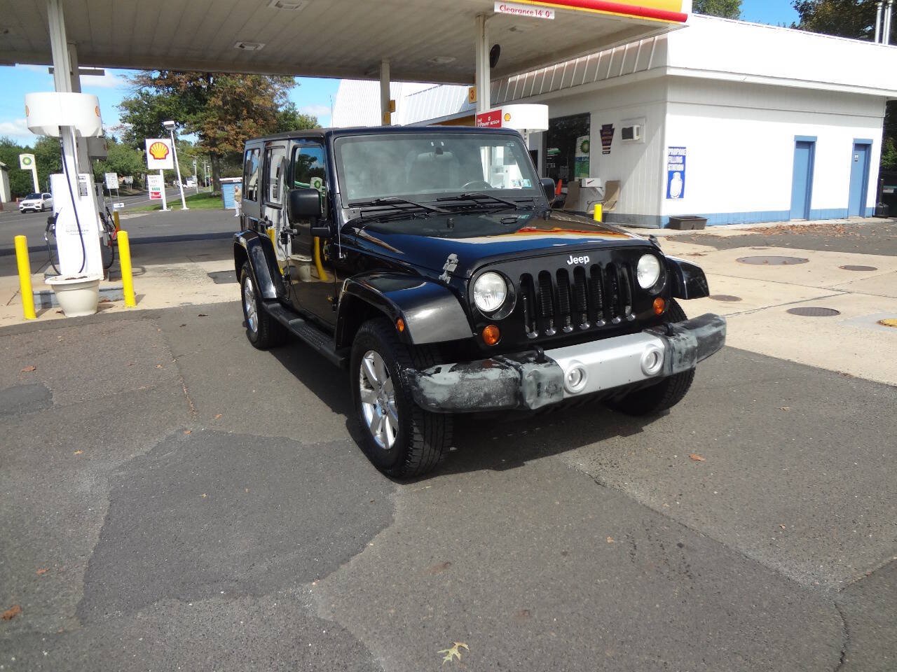 Used 2012 Jeep Wrangler Unlimited Sahara w/ Dual Top Group AWD/4WD image 6