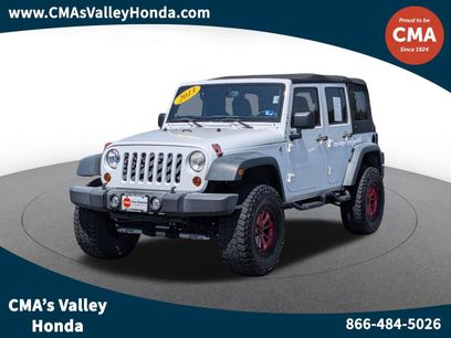 Used 2013 Jeep Wrangler Unlimited Sport
