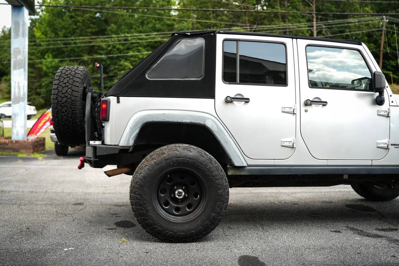 Used 2012 Jeep Wrangler Unlimited Rubicon w/ Dual Top Group AWD/4WD image 29