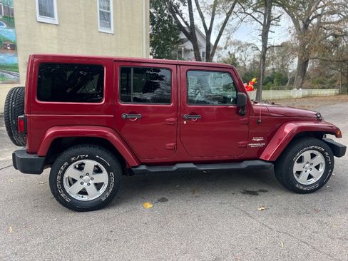 Used 2012 Jeep Wrangler Unlimited Sahara w/ Dual Top Group image 12