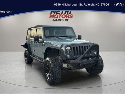 Used 2014 Jeep Wrangler Unlimited Sport image 1