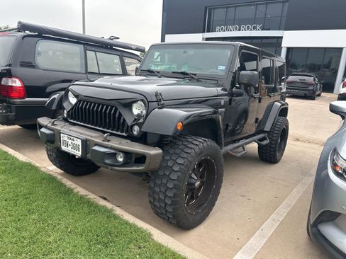 Used 2016 Jeep Wrangler Unlimited Sahara AWD/4WD image 1