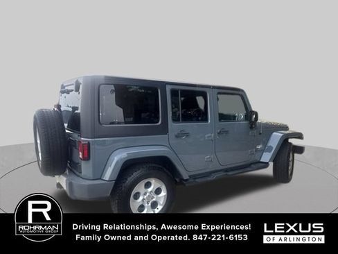 Used 2014 Jeep Wrangler Unlimited Sahara w/ Dual Top Group AWD/4WD image 3