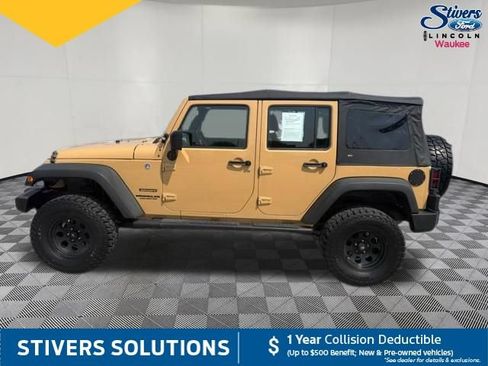 Used 2013 Jeep Wrangler Unlimited Sport w/ Mopar Black Appearance Group AWD/4WD image 11