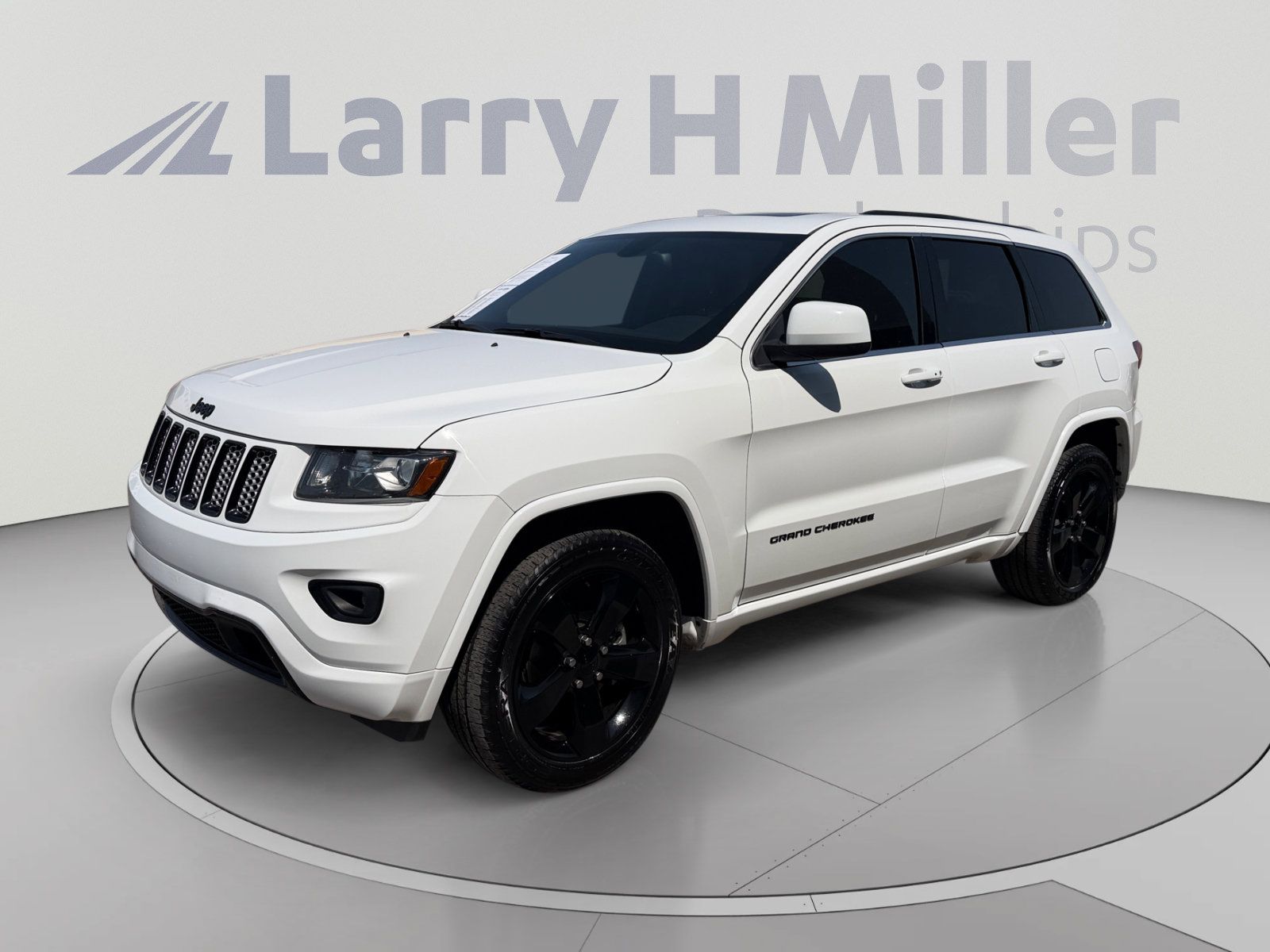 Used 2015 Jeep Grand Cherokee Altitude RWD image 1