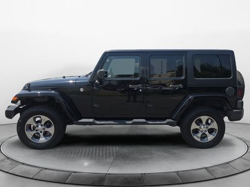 Used 2016 Jeep Wrangler Unlimited Sahara w/ Dual Top Group AWD/4WD image 2