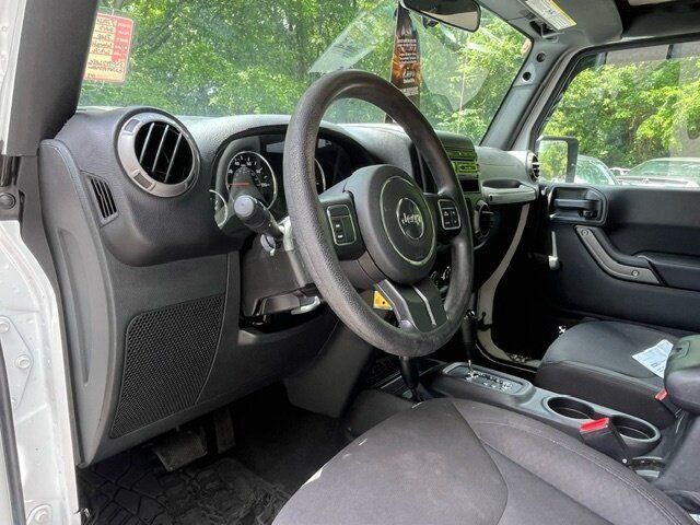 Used 2017 Jeep Wrangler Unlimited Sport w/ Mopar Black Appearance Group AWD/4WD image 8