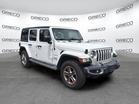 Used 2018 Jeep Wrangler Unlimited Sahara w/ Cold Weather Group AWD/4WD image 1