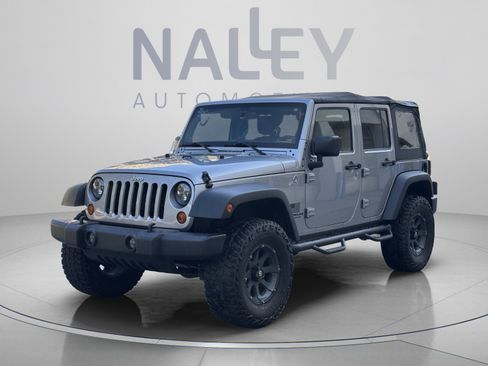 Used 2013 Jeep Wrangler Unlimited Sport AWD/4WD image 1