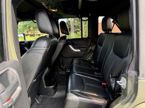 Used 2015 Jeep Wrangler Unlimited Sahara w/ Dual Top Group AWD/4WD image 12