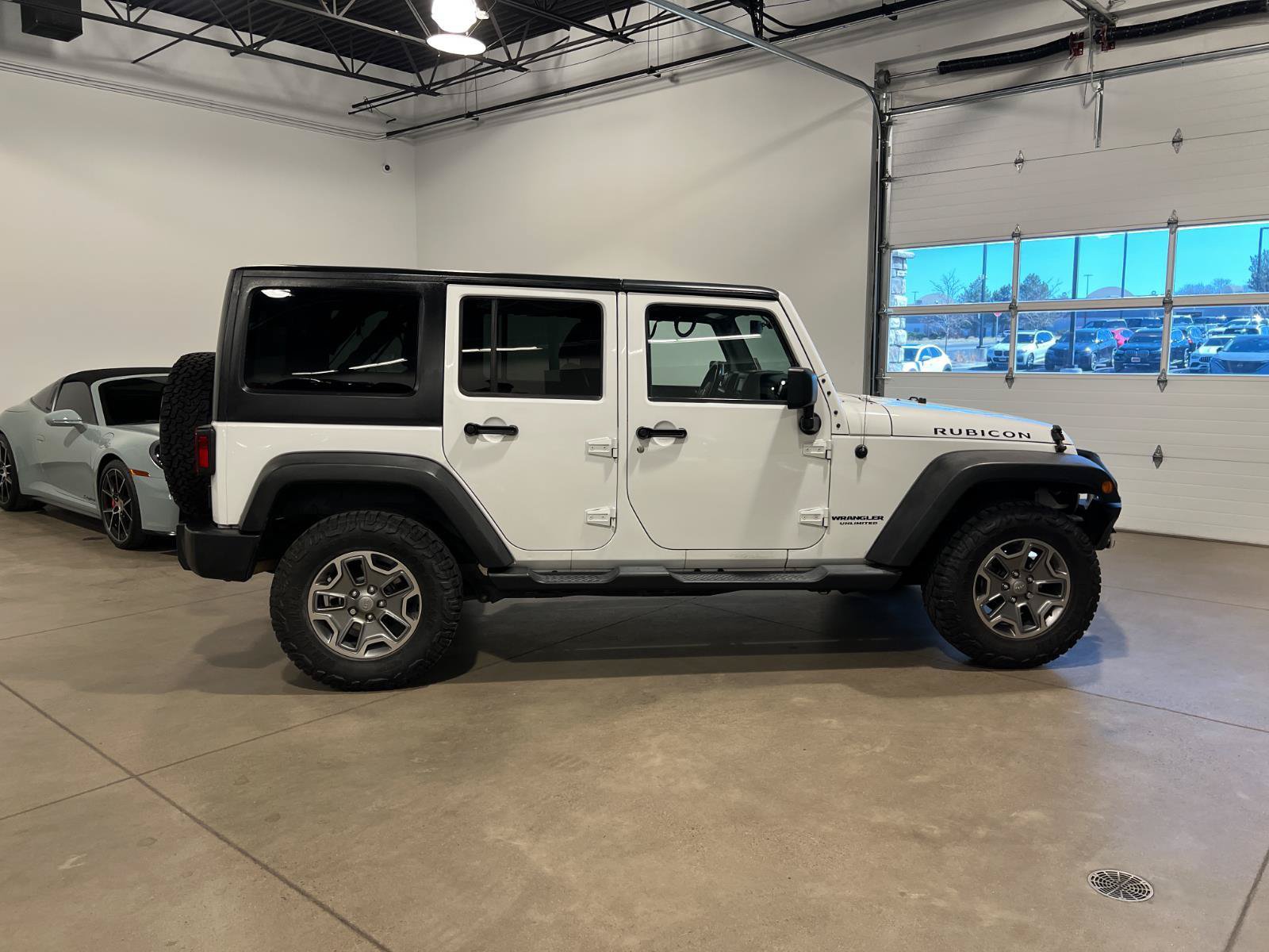 Used 2014 Jeep Wrangler Unlimited Rubicon w/ Dual Top Group AWD/4WD image 2