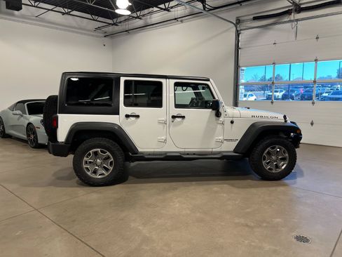Used 2014 Jeep Wrangler Unlimited Rubicon w/ Dual Top Group AWD/4WD image 2