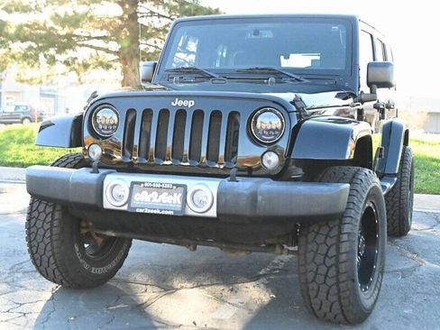 Used 2015 Jeep Wrangler Unlimited Sahara w/ Dual Top Group AWD/4WD image 4