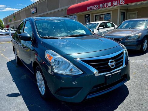 Used 2015 Nissan Versa SV FWD image 1