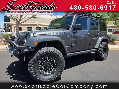 Used 2014 Jeep Wrangler Unlimited Rubicon w/ Connectivity Group AWD/4WD image 1