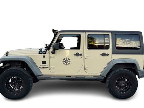 Used 2011 Jeep Wrangler Unlimited Sport image 1