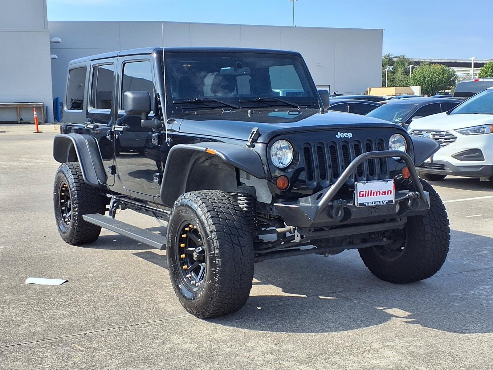 Used 2012 Jeep Wrangler Unlimited Sahara w/ Connectivity Group AWD/4WD image 2
