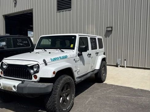 Used 2012 Jeep Wrangler Unlimited Sahara AWD/4WD image 1
