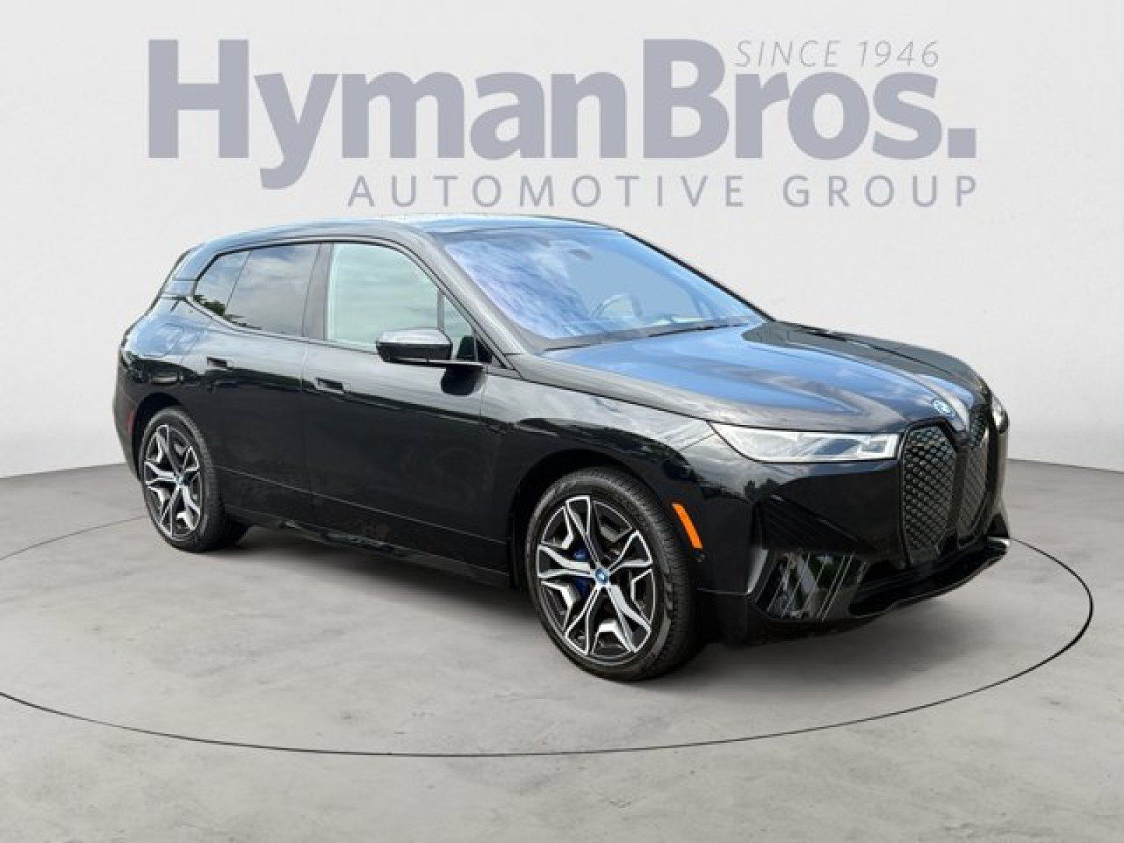 Used 2024 BMW iX xDrive50 w/ Sport Package AWD/4WD image 1