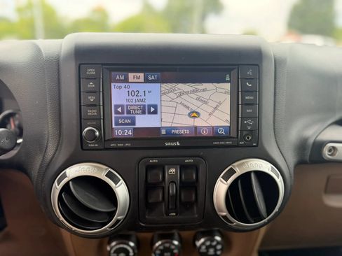Used 2012 Jeep Wrangler Unlimited Sahara w/ Dual Top Group AWD/4WD image 17