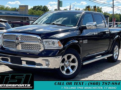 Used 2014 RAM 1500 Laramie AWD/4WD image 1