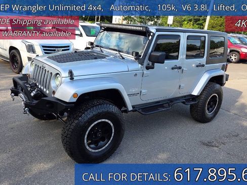 Used 2010 Jeep Wrangler Unlimited Sahara w/ Dual Top Group AWD/4WD image 1