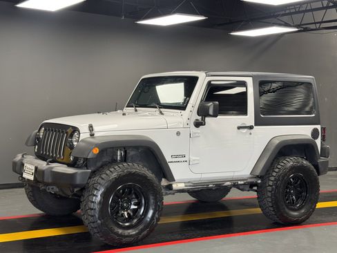 Used 2015 Jeep Wrangler Sport w/ Mopar Black Appearance Group image 1