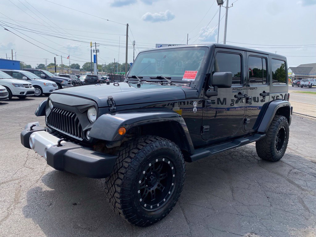 Used 2013 Jeep Wrangler Unlimited Sahara w/ Dual Top Group AWD/4WD image 7
