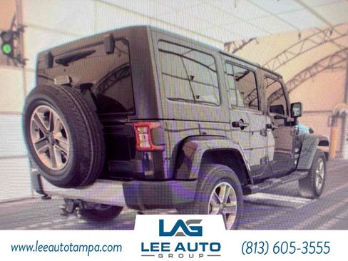 Used 2012 Jeep Wrangler Unlimited Sahara AWD/4WD image 2