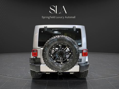 Used 2014 Jeep Wrangler Unlimited Sahara w/ Dual Top Group AWD/4WD image 6