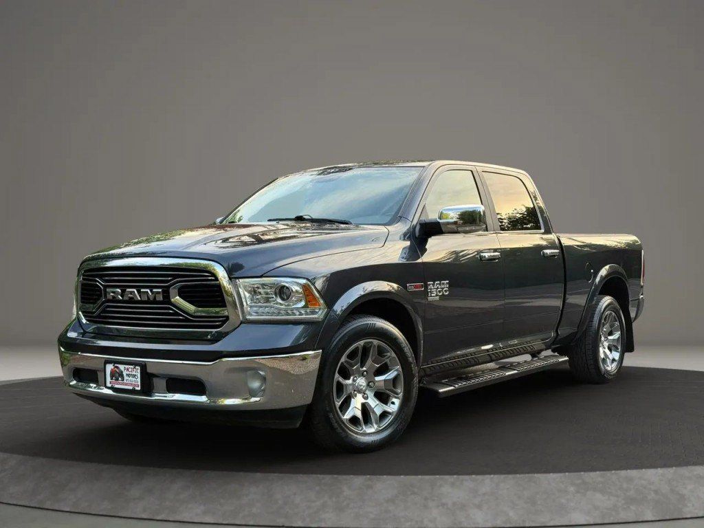 Used 2019 RAM 1500 Laramie AWD/4WD image 1