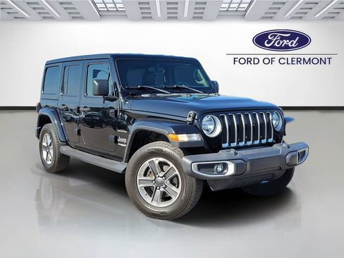 Used 2021 Jeep Wrangler Unlimited Sahara AWD/4WD image 1